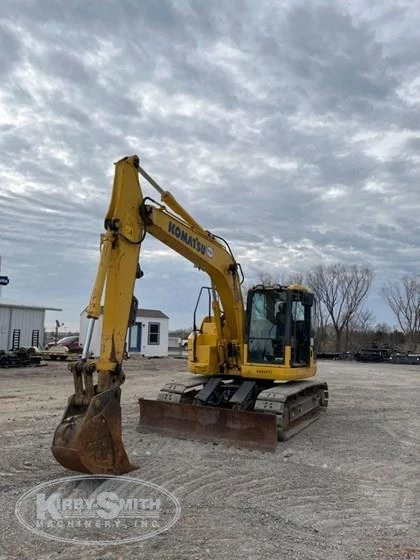 Used Komatsu Excavator under the blue sky